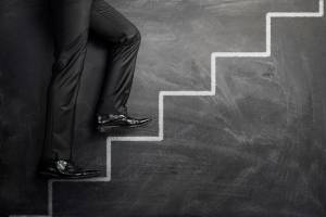 man-walking-up-the-stairs